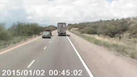 Tailgating motorist rolls vehicle on I-10